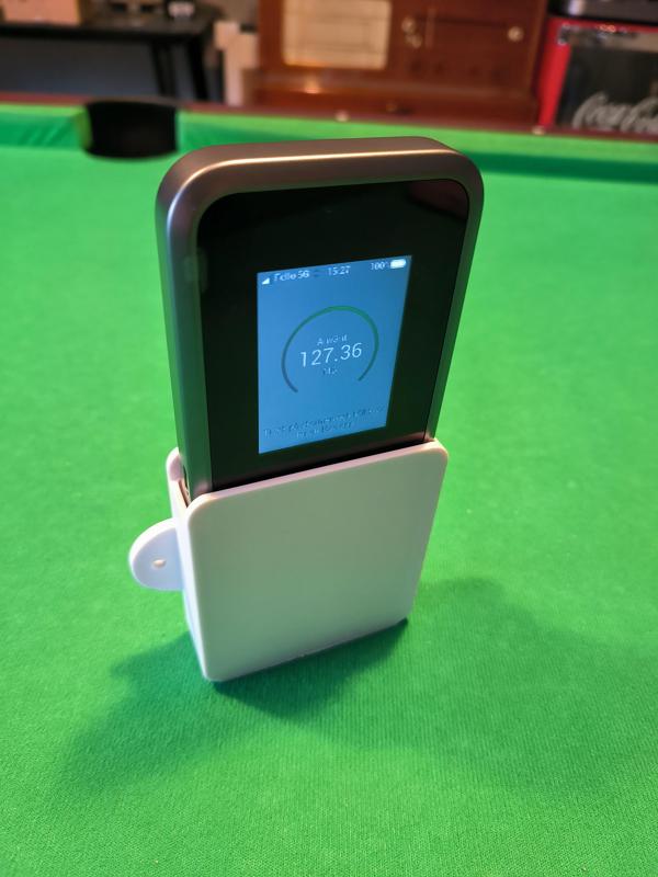 Wall mount for ZTE MU5120 router.