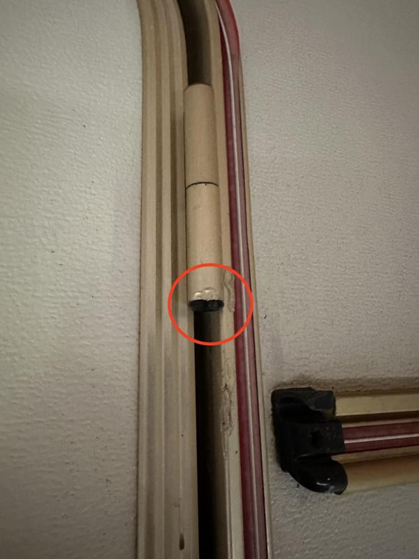 Caravan door hinge plug