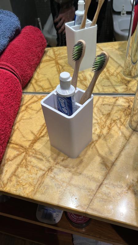 Toothbrush and paste organizer