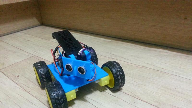 Create a robot car to avoid obstacles