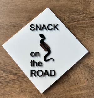 Snack on the Road - road sign