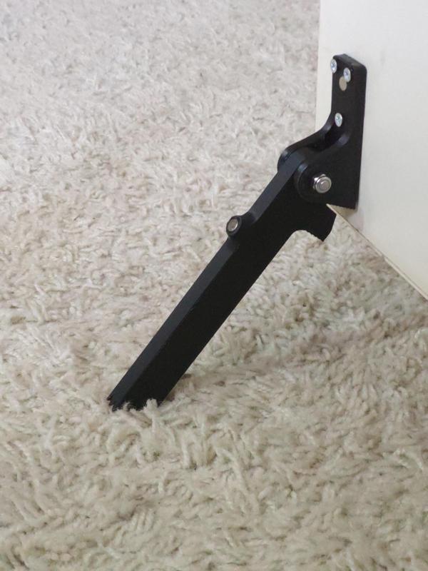 Kickdown door stopper