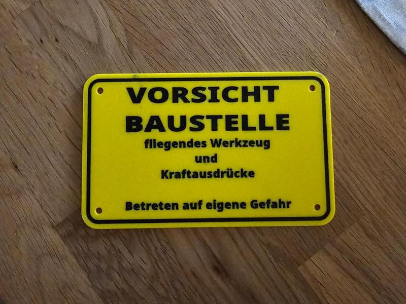 Funny sign Caution construction site!