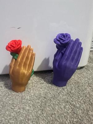 Rose in Hand Sculpture