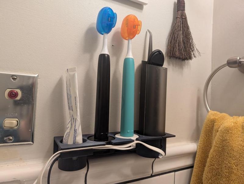 Electric toothbrush and flosser holder