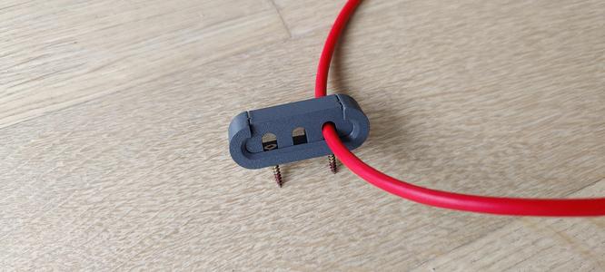 Elegant Cable Clip wall mount, resizable, reusable.