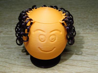 Bobblehead with hair