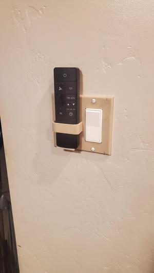 Fan remote light switch holder