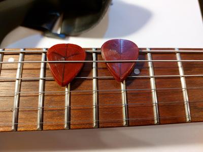 Guitar Pick but very THICK