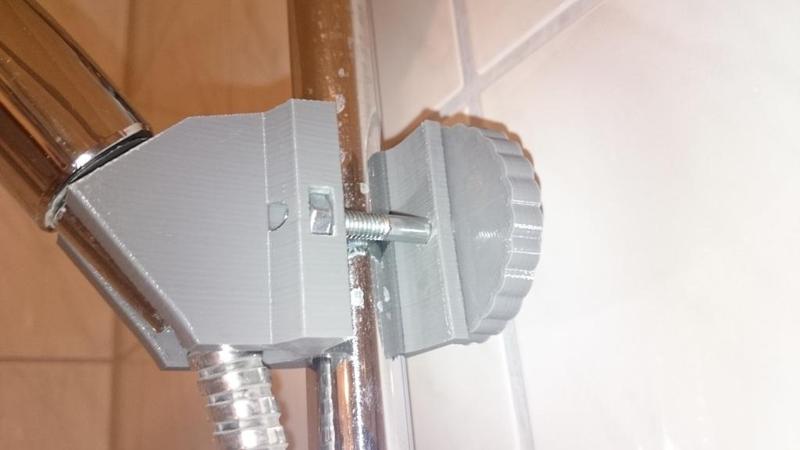 Shower head holder with fixation