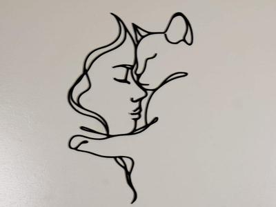 Cat and woman wall decoration