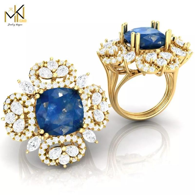 RING with deep blue color stone embraced by diamonds