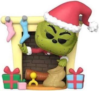 Christmas themed Grinch doll on the fireplace
