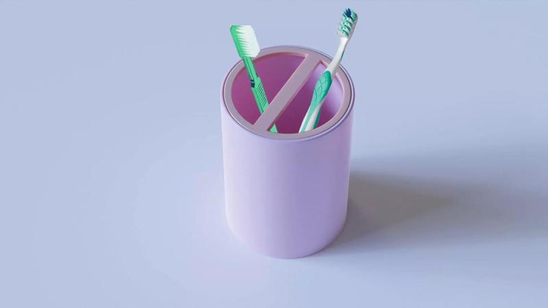 Cup holder for 2 toothbrushes