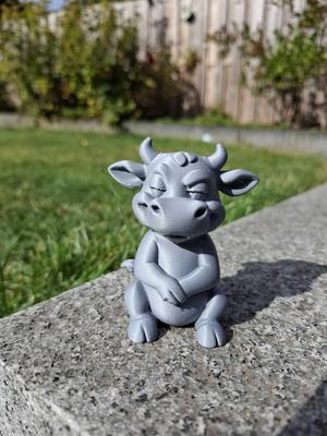 Mischievous Cow Figurine