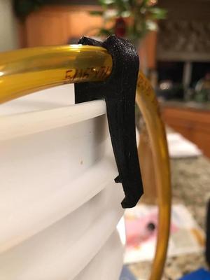 Wine racking hose holder