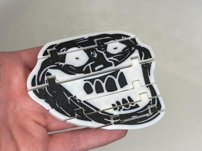 Articulated Flexi Creepy Troll Face Fidget Toy
