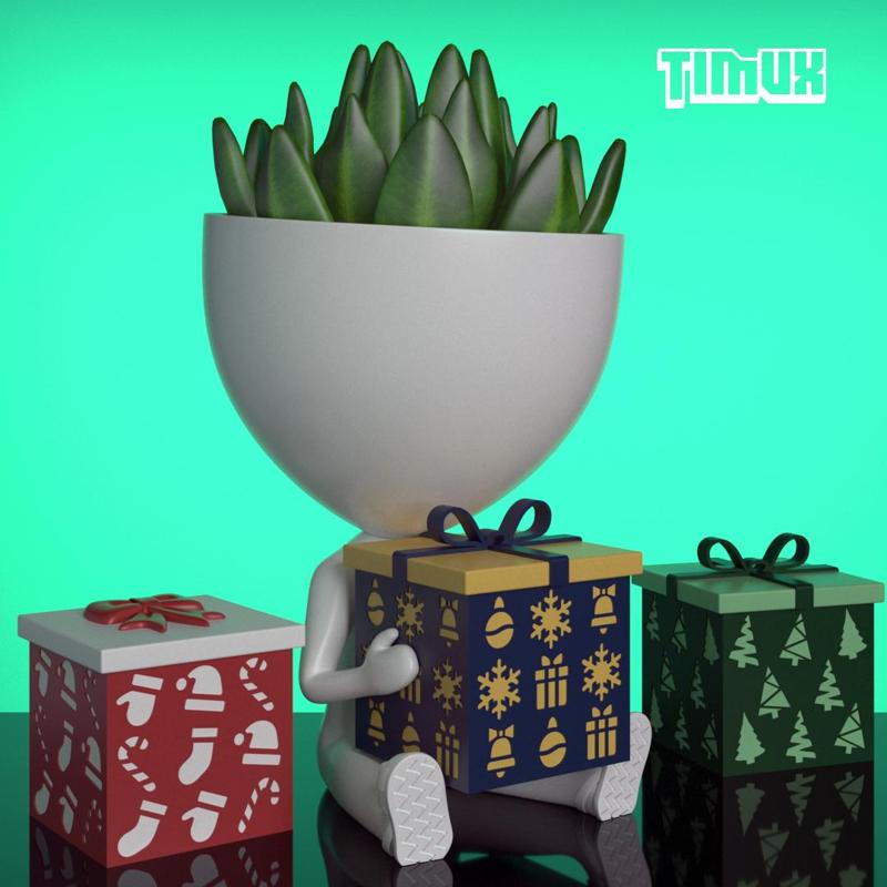 ROBERT PLANT WITH A CHRISTMAS GIFT BOX