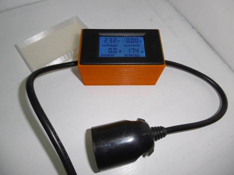 Case for voltmeter / ampermeter PZEM-061 with its protective cover.