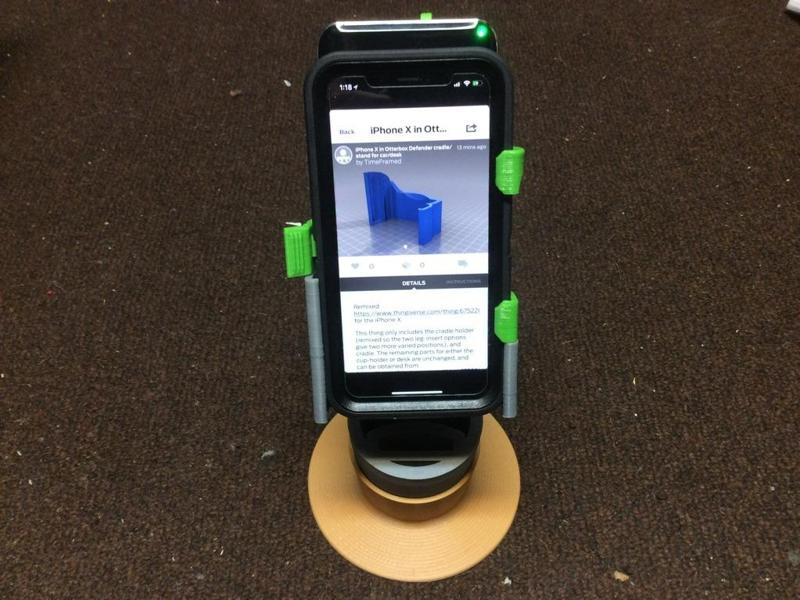 iPhone X in Otterbox Defender cradle/stand for car/desk
