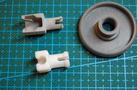 Dishwasher wheel clips