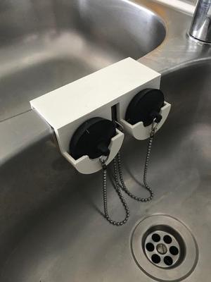 Sink plug holder