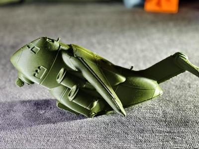 Q version of the large Y-20 transport aircraft, with magnetically attached cargo bay that can be opened