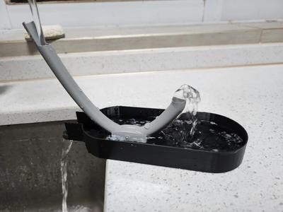 Cat drinking fountain