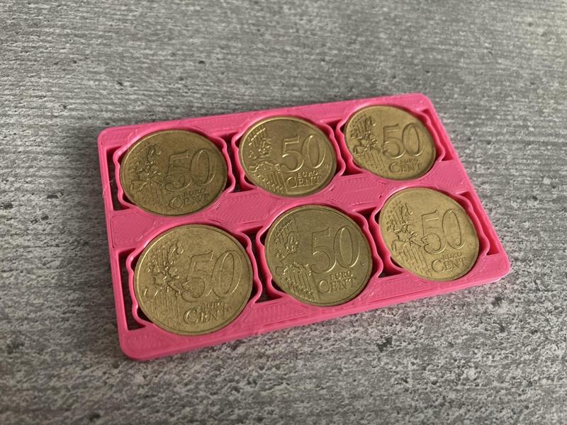 Credit card 50 cent coin holder