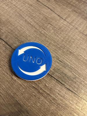 UNO play direction coin