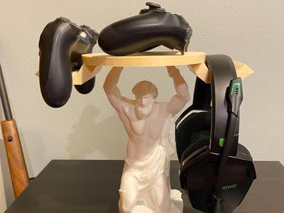 The cursed titan Atlas headphone/controller holder