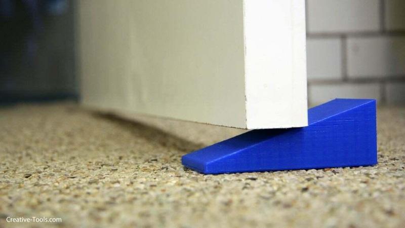 A door stop in form of a big wedge.