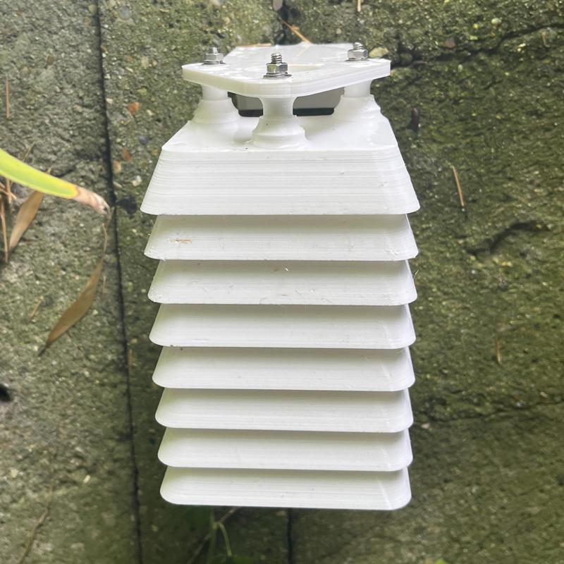 Small rectangular shelter for weather sensor.