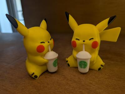 Pikachu enjoying coffee