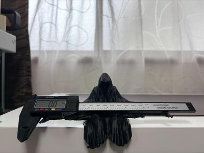 Grim Reaper Shelf Sitting Caliper Holder