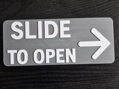Slide to Open Sign
