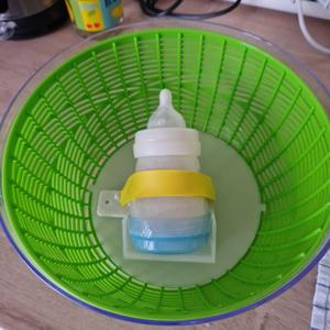 Baby bottle centrifuge