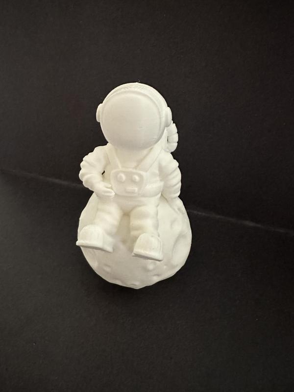 Astronaut sitting on the moon