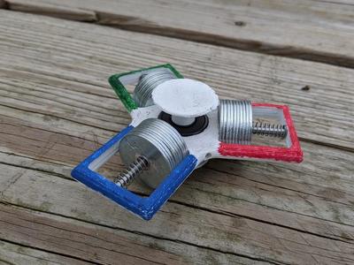 Variable Moment of Inertia Fidget Spinner