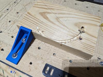 CNC clamp hold down for 2 x4 size lumber.