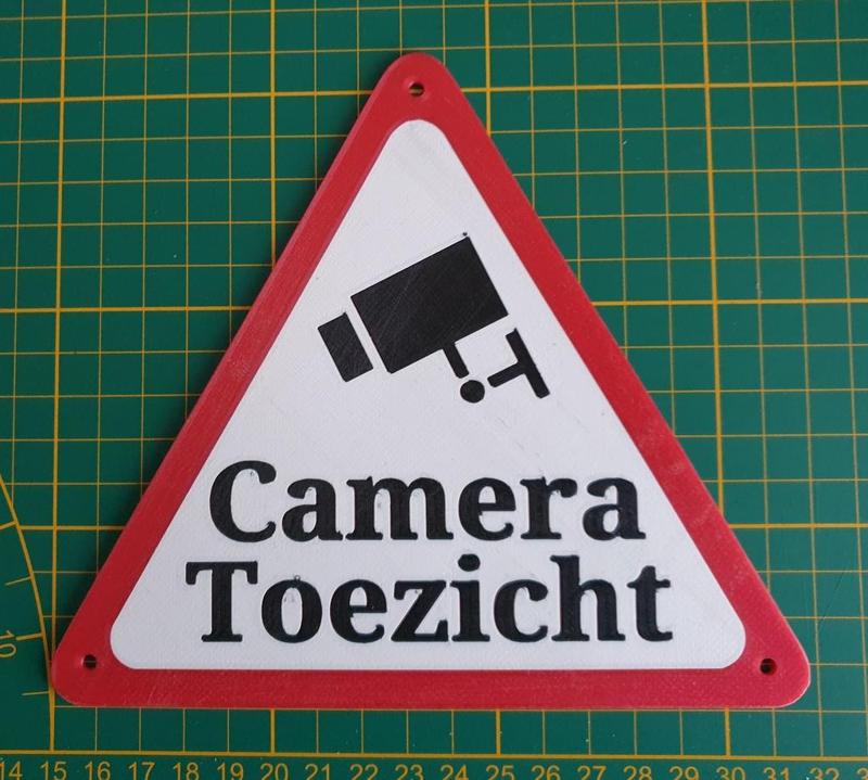 Security camera warning sign