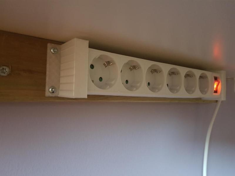 Multi-way extension cord holder