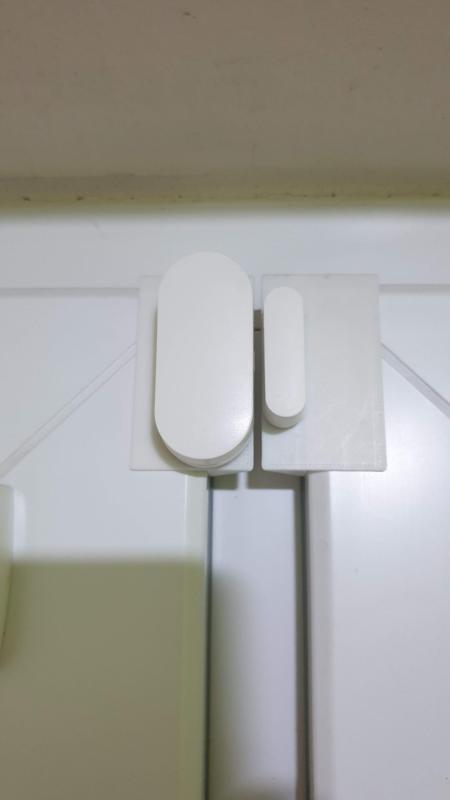 ZigBee window sensor holder.