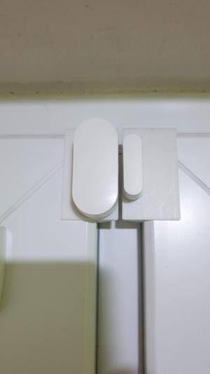 ZigBee window sensor holder.