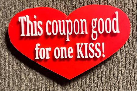Heart shaped coupon good for one kiss