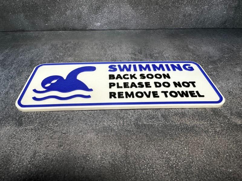 Beach Towel reservation sign