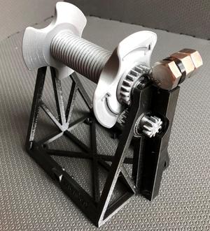 Multiple Mechanism Auto-Rewind Spool Holder