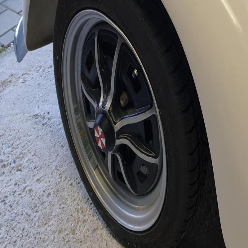 Lemmerz Nabenkappe mit Umbrella Corp. Logo