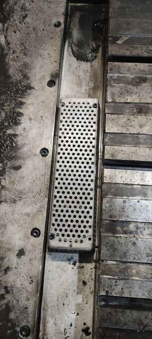 Grid for machine pump drainage.