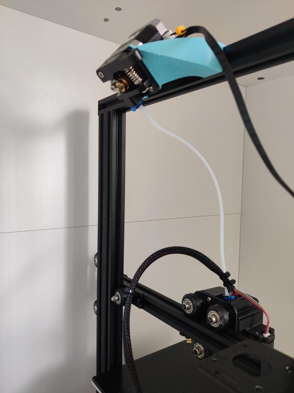 Top bar extruder relocator